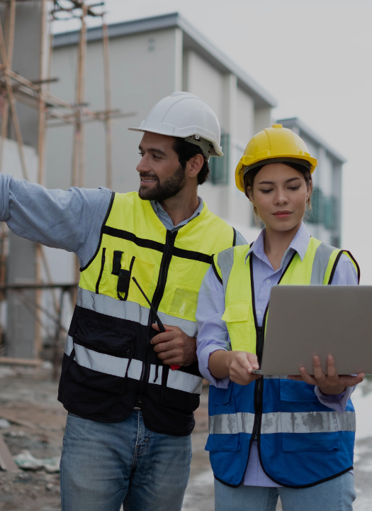 Construction marketing strategy in action with contractor reviewing plans on site