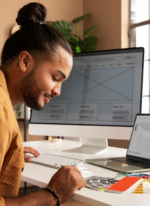 Professional website designer working on responsive layouts